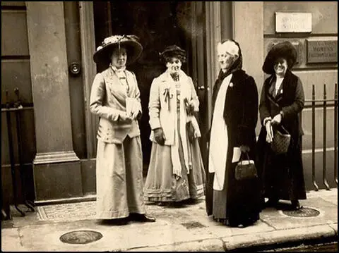 Edith How-Martyn, Emma Sproson, Charlotte Despard and Constance Tite outside the offices of the Women's Suffrage League (c.1910)