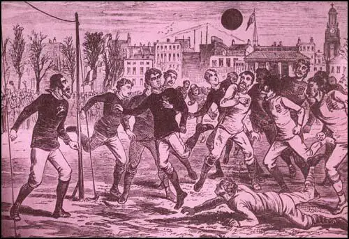England against Scotland in 1877. The Scottish goalkeeper is on the left. At thistime the keeper wore the same colour shirt as the rest of the team.