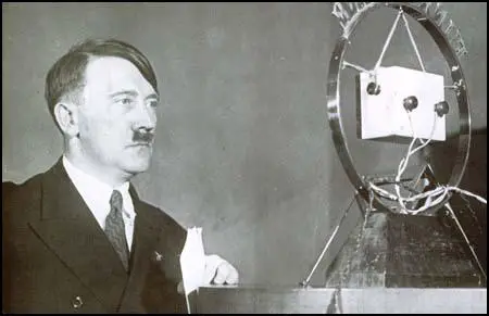 Adolf Hitler addresses the German people on radio.