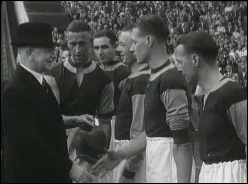 Charlie Bicknell introduces the West Ham players before the game.