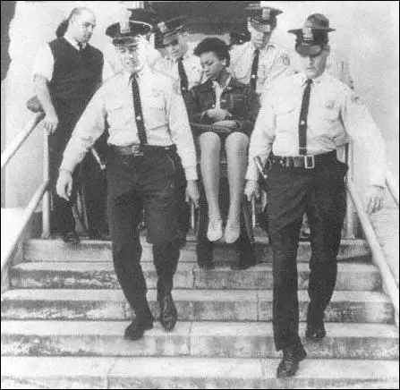 Doris Jean Castle being removed from the New Orleans City Hall cafeteria (1963)