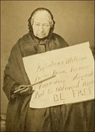 Anne Knight, photograph by Victor Franck in about 1855. The placard reads: "By tortured millions, By the Divine Redeemer, Enfranchise Humanity, Bid the Outraged World, BE FREE".