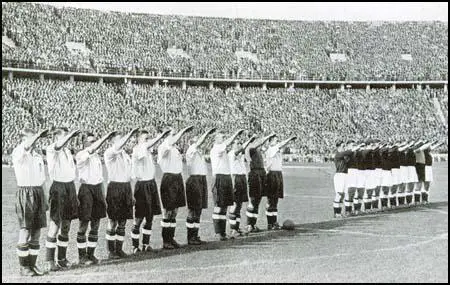 The England team give the Nazi salute in May 1938.