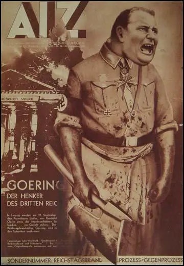 John Heartfield, Executioner of the Third Reich (September, 1933) (Copyright The Official John Heartfield Exhibition & Archive)