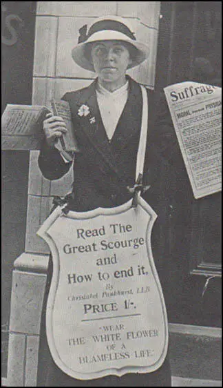 WSPU member selling The Great Scourge (1913)