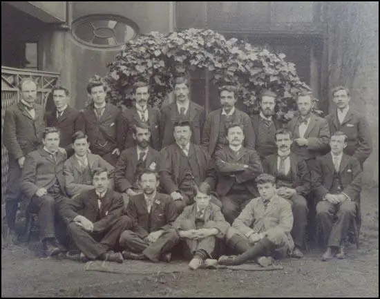 Photograph of the first students at Ruskin College. Edward Traynor (top, first left), Robert Carruthers (top, third left), Bertram Wilson (top, eighth left), Dennis Hird (middle, fourth left), Frank Merry (middle, sixth left) and Joseph Heywood (middle, seventh left).