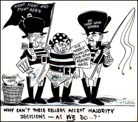 Vicky, cartoon showing Harold Wilson, Aneurin Bevan, Michael Foot, Ian Mikardo attacking Herbert Morrison, Clement Attlee and Hugh Gaitskell (July, 1951)