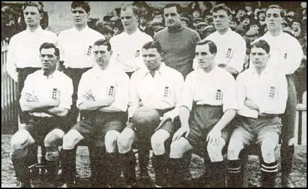 The England team that played Wales in March 1921. Buchan is carrying the ball.