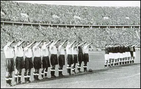 The England team give the Nazi salute in May 1938.