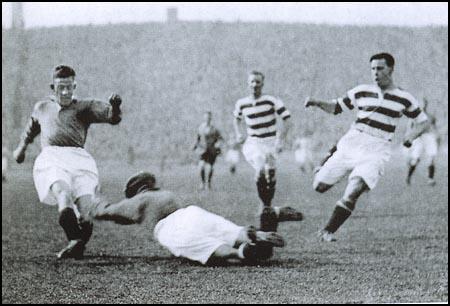 John Thomson diving at the feet of Sam English on 5th September, 1931.