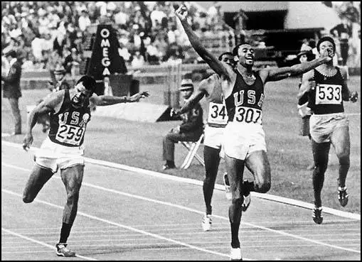Tommie Smith beats John Carlos and Peter Norman (not in picture) in the 200m final.