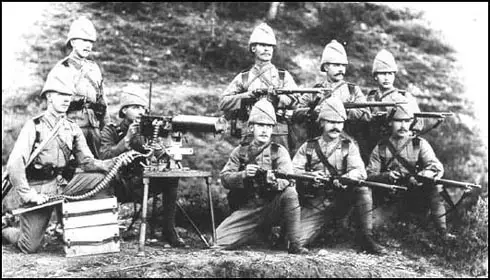 The King's Royal Rifles in 1895. The men have a Maxim Machine Gun and Lee-Enfield rifles.