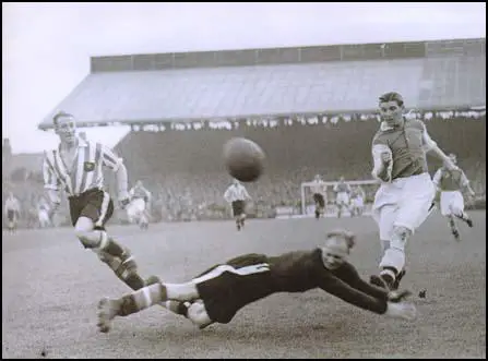 Ted Drake in action against Brentford on 8th September 1938.
