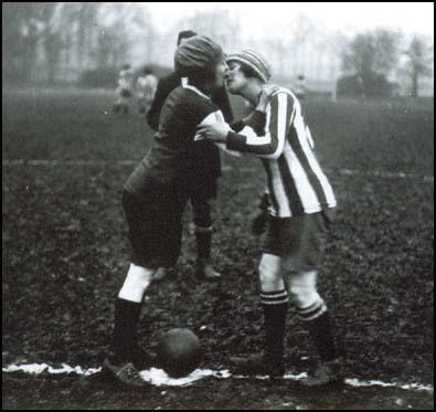 Two captains kissing before a game in 1921.