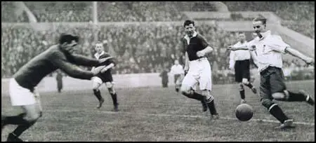 Billy Walker scores for England against Scotland in 1924.