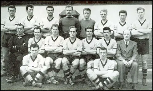 The Wolves team that won the First Division championship in 1957-58. Left to right,back row: Jerry Harris, Eddie Clamp, Eddie Stuart, Malcolm Finlayson, Noel Dwyer,Ron Flowers, Jimmy Mullen and Bill Slater. Middle row: Joe Gardiner (trainer),Norman Deeley, Peter Broadbent, Billy Wright, Bobby Mason, Colin Booth andStan Cullis (manager). Front row: Jimmy Murray and George Showell.