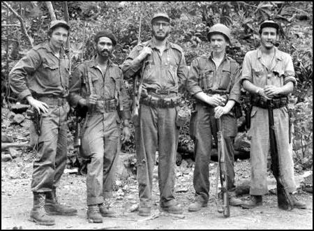 Juan Almeida (second from the left) with Fidel Castro.