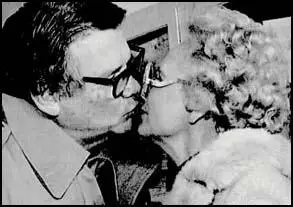 Billie Sol Estes kisses his wife, Patsy, after leaving prison in November, 1983.