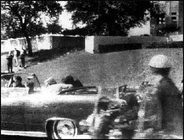 The photograph taken by Mary Moorman that shows the grassy knoll.