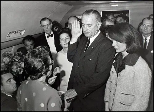 The swearing-in of Lyndon Johnson on Air Force One, photographed by Cecil Stoughton.