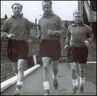 Stanley Matthews, Harry Johnston and Wilf Mannion trainingbefore the England international against Sweden in November 1947.