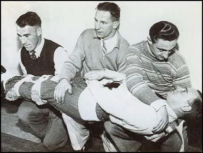 Emlyn Williams, Andrew Beattie and Lloyd Iceton practice firstaid at the local Air Raid Precautions centre in November, 1939.
