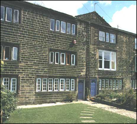 The three cottages at Landside where the Fieldens livedand worked. Fielden added a third story in about 1800.