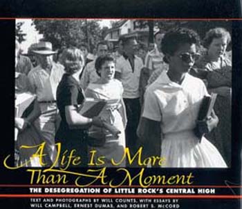 Elizabeth Eckford attempting to enter Little Rock Schoolon 4th September, 1957. The girl shouting is Hazel Massery.