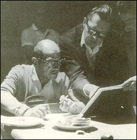 Luis Buñuel and Hugo Butler working together on a script.