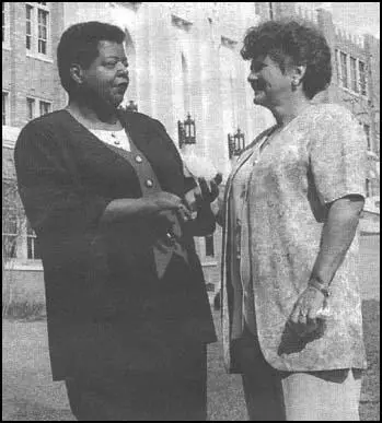 Elizabeth Eckford and Helen Masseryoutside Little Rock High School in 1998.