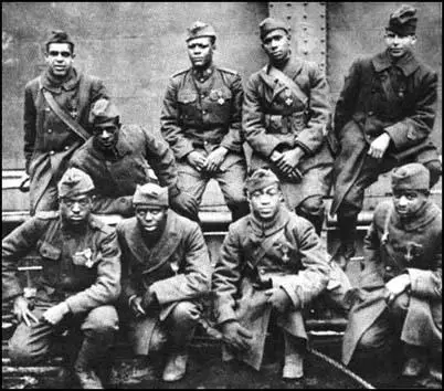 Soldiers from the 369th Infantry Regiment proudly wearing their Croix de Guerre medals.