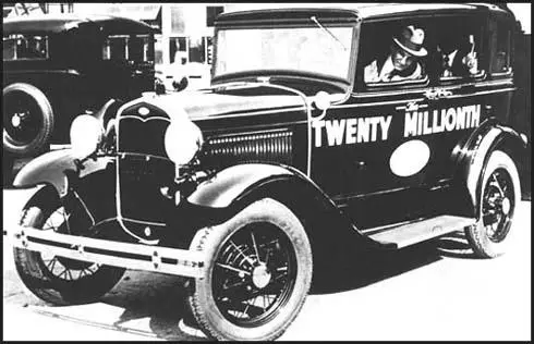 Henry Ford drives out his 20 millionth car on 24th April 1931.