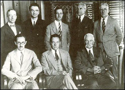 New York Word editorial staff: Seated, left to right, Charles Merz, Walter Lippmann, John L. Heaton. Standing: William O. Scroggs, James M. Cain, Allan Nevins, Rollin Kirby and L.R.E. Paulin.