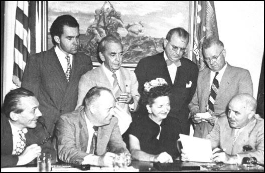 Elizabeth Bentley with members of the HUAC: JohnMcDowell, Richard Nixon, Karl Mundt, John Rankin,F. E. Hebert, J. H. Peterson and J. Parnell Thomas.