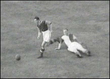 Len Goulden races past a Blackburn Rovers defender.
