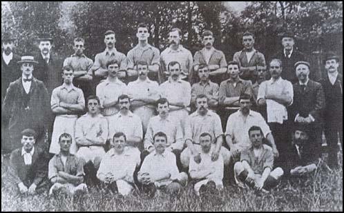 West Ham in 1899. Back (left to right): C. Barker, A. Woodcock, Charles Craig,H. Sunderland, Henry Gilmore, F. Adams. Second row: Fred Corbett, Charlie Dove,Tommy Dunn, Syd King, James Bigden, L. Foss, M. Higham, Sam Wright (trainer).Seated; W. James, Ken McKay, Tommy Moore, Albert Carnelly, Tom Bradshaw.Front; J. Walker, Peter McManus, Bill Joyce, Roderick McEachrane, Simon Chisholm.