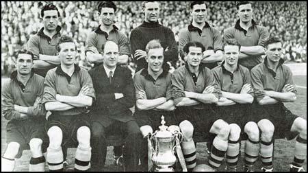 The Wolves team that won the FA Cup victory in 1949 against Leicester City.Back row (left to right): Billy Crook, Roy Pritchard, Bert Williams, Bill Shorthouse,Terry Springthorpe. Front row: Johnny Hancocks, Sammy Smyth, Stan Cullis,Jesse Pye, Jimmy Dunn and Jimmy Mullen.