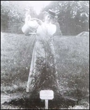 Emily Blathwayt watering the tree planted for Clara Codd.