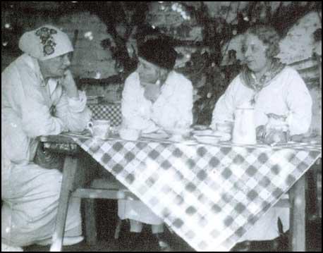 Edith Craig, Clare Atwood and Christabel Marshall in the garden of the The Priest's House.