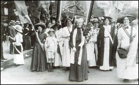 Charlotte Despard in front of the Women's Freedom League banner (17th June 1911)
