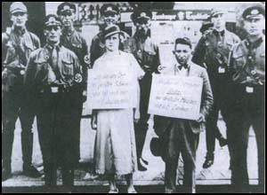 Two Germans accused of breaking Nazi Laws.